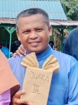 <center>Wali Kelas & Pembina Rohis<br>Zulharizal, S.HI</center>